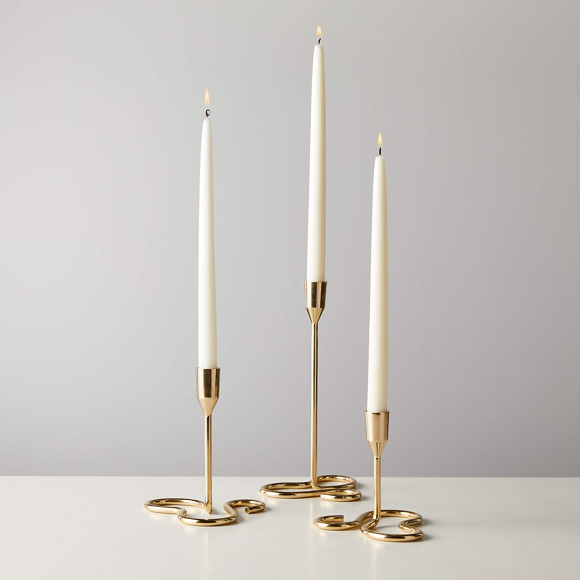 Motion Brass Taper Candle Holders Set Of 3 | CB2