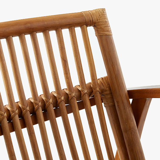 Noelie Rattan Lounge Chair with Black Cushion