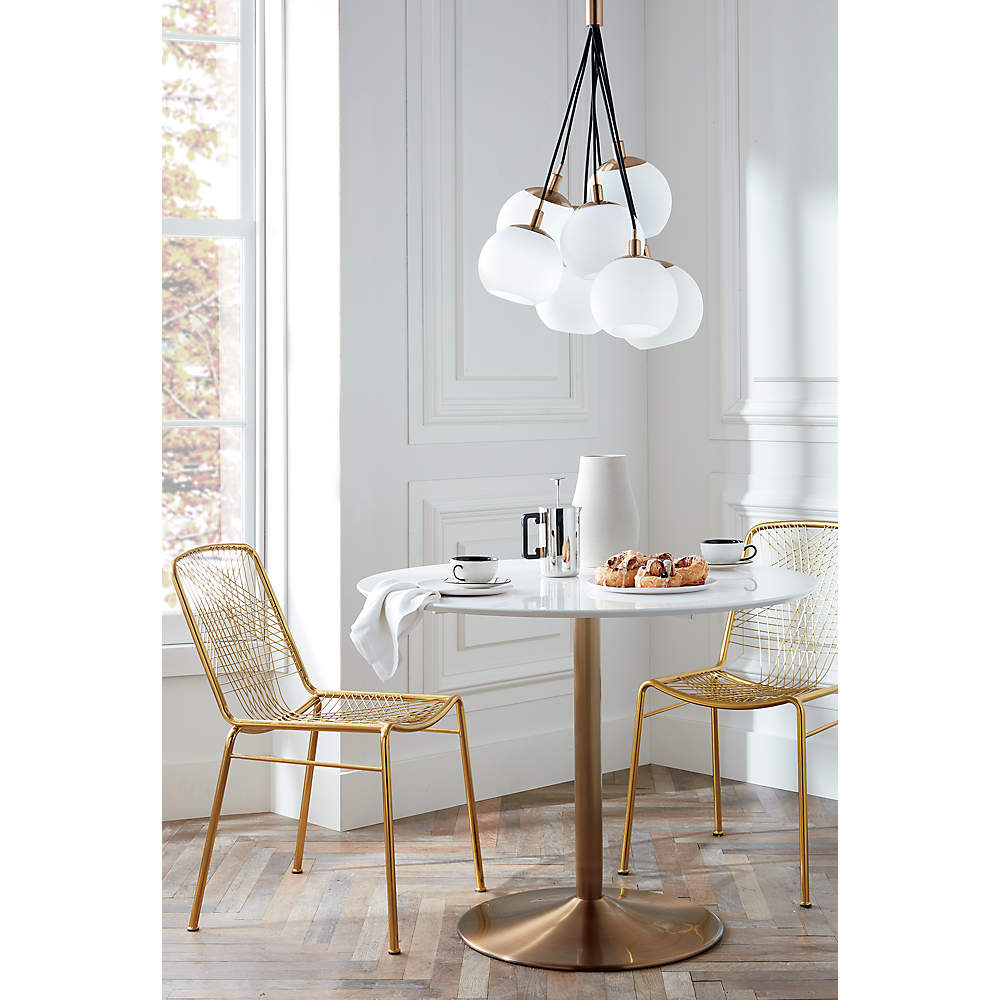 brass and white dining table