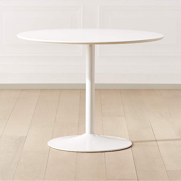 white round pedestal table