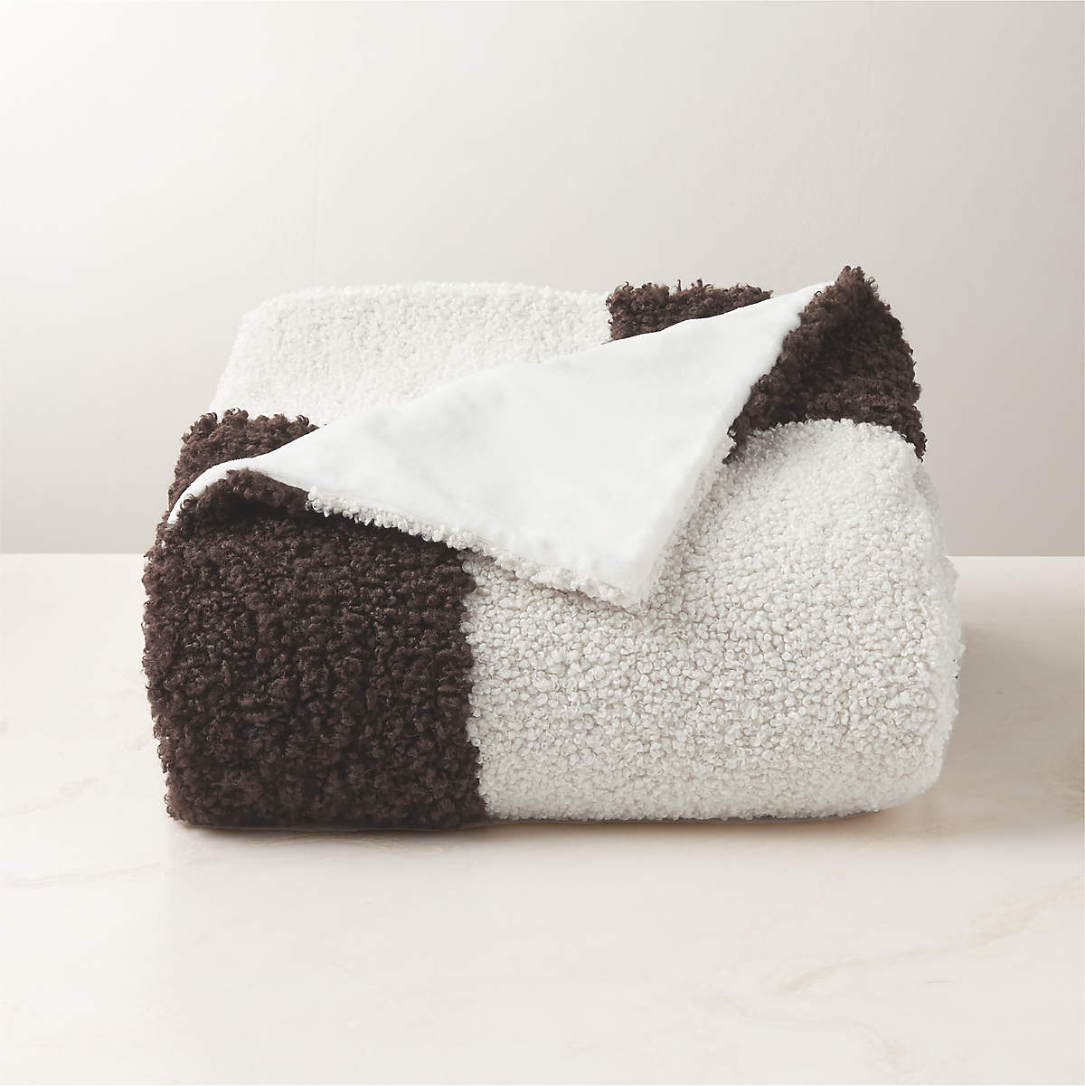 Olio Dark Brown and White Faux Fur Throw Blanket CB2