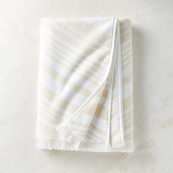 https://cb2.scene7.com/is/image/CB2/OncaWhtIvryOrgCttnBthTwlSHF23/$web_pdp_main_carousel_xs$/230605141026/onca-organic-cotton-ivory-and-white-bath-towel.jpg