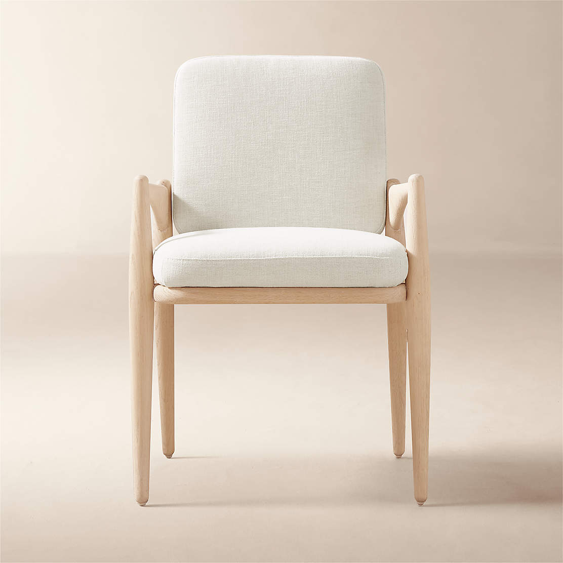 Casa Viva Ivory White Upholstered Dining Armchair CB2