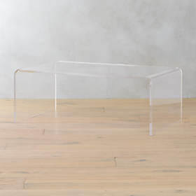 Cb2 lucite 2024 coffee table