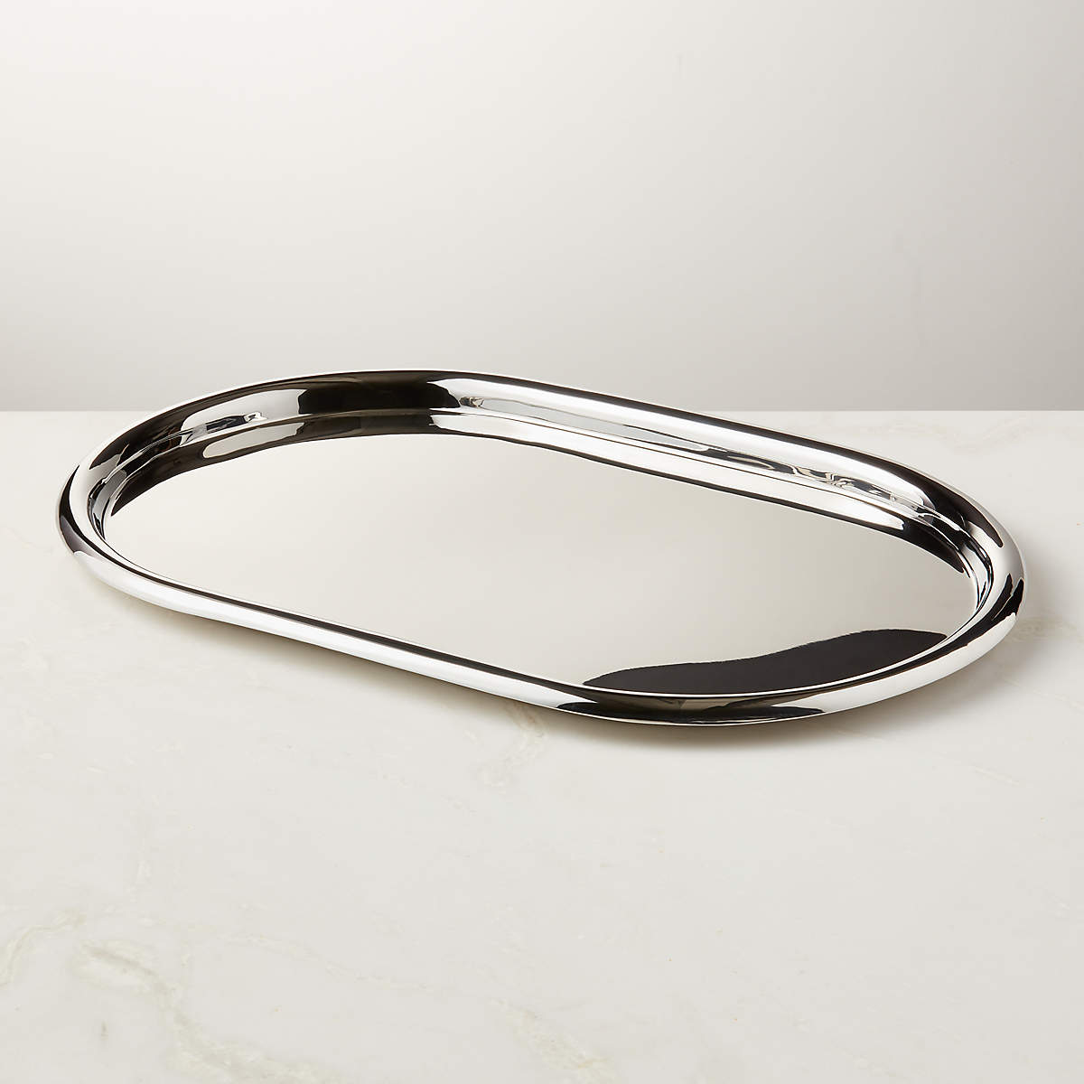 Piero Oval Polished Stainless Steel Serving Tray by Gianfranco Frattini + Reviews | CB2