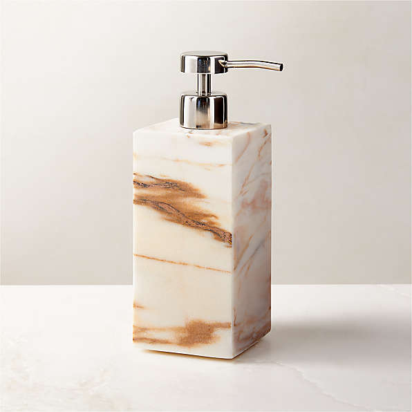 https://cb2.scene7.com/is/image/CB2/RamseyGldClctMrbSoapPumpSHF23/$web_plp_card_mobile_hires$/230720101554/ramsey-calacatta-gold-marble-soap-pump.jpg