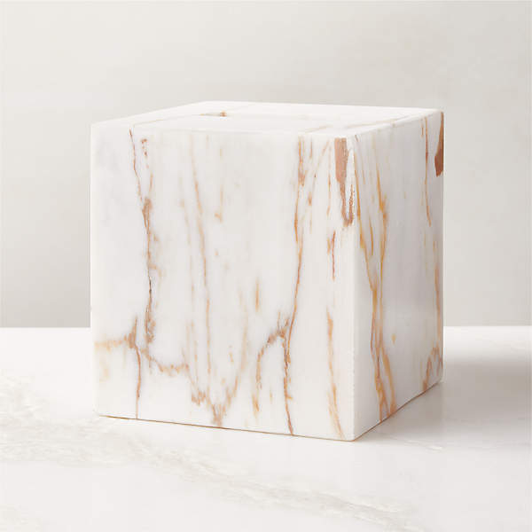 https://cb2.scene7.com/is/image/CB2/RamseyGldClctMrbTissueBxSHF23/$web_pdp_main_carousel_xs$/230720101409/ramsey-calacatta-gold-marble-tissue-box-cover.jpg