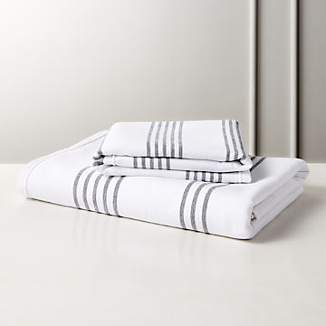 white bath towels with black trim