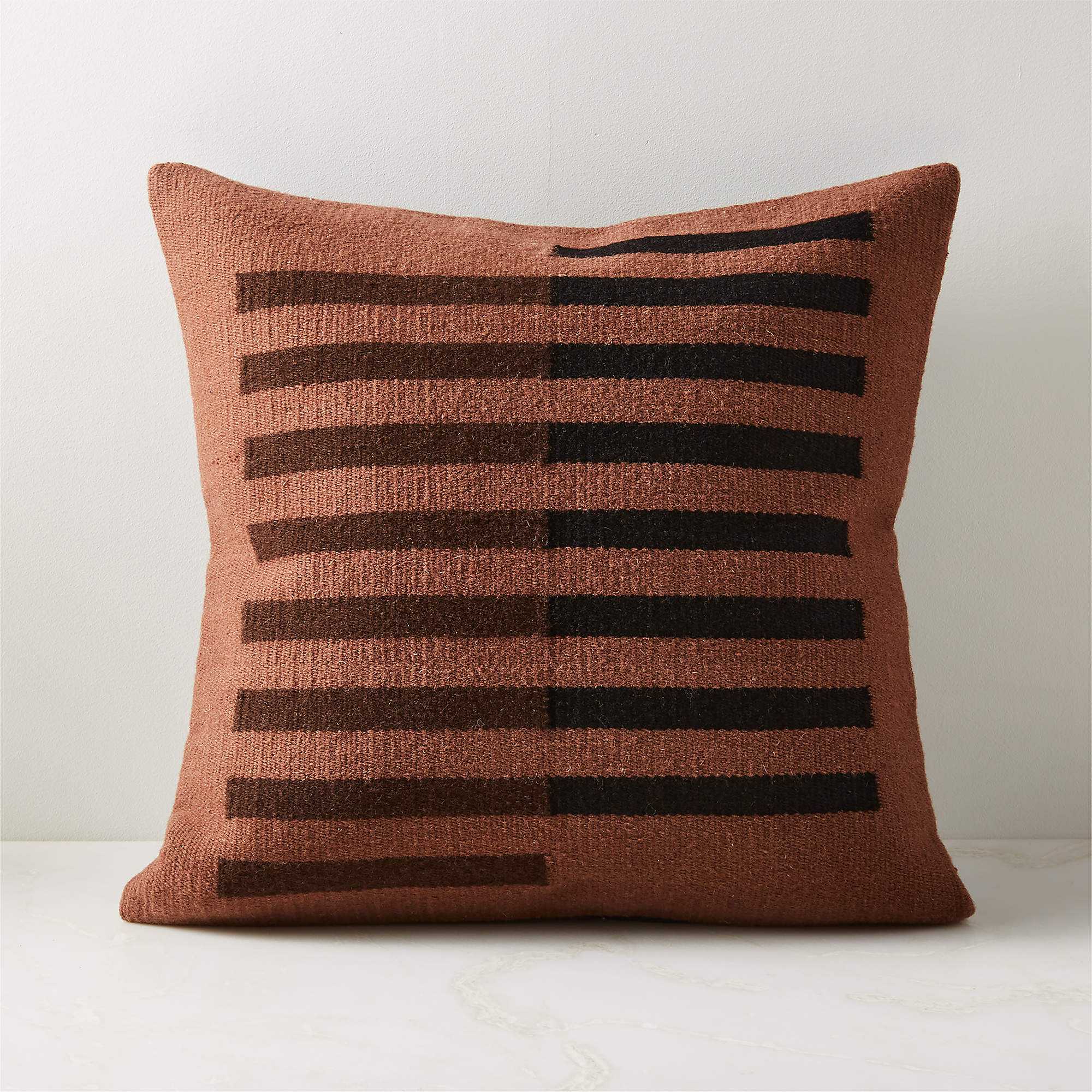 Shop Rhava Woven Brown Throw Pillow with Insert 20 from CB2 on Openhaus