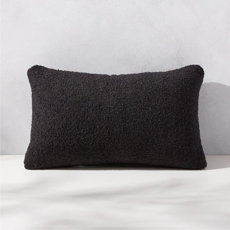 https://cb2.scene7.com/is/image/CB2/SilvesBclBlkODPillow20x12SHS23