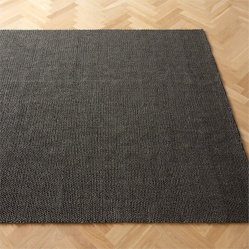 https://cb2.scene7.com/is/image/CB2/SisalBlackRug8x10SHF23/$web_pdp_main_carousel_sm$/230712122349/sisal-handwoven-charcoal-grey-area-rug.jpg