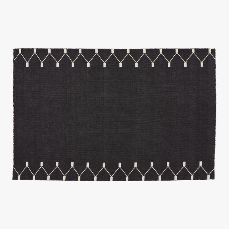 Sorena Black and Warm White Indoor/Outdoor Reversible Performance Area Rug 6'x9' CB2