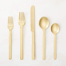 https://cb2.scene7.com/is/image/CB2/Stile5PcBrshdGldFltwrStSHS24/$web_recently_viewed_item_sm$/231130120804/stile-5-piece-brushed-gold-flatware-set.jpg