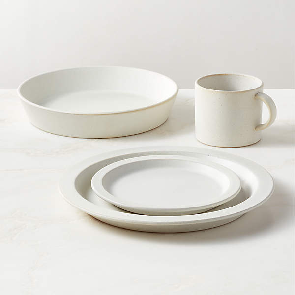 https://cb2.scene7.com/is/image/CB2/SwoonReactIvory4PcStWPstSHF23/$web_pdp_main_carousel_xs$/230926165805/swoon-4-piece-off-white-dinnerware-set-with-pasta-bowl-with-reactive-glaze.jpg