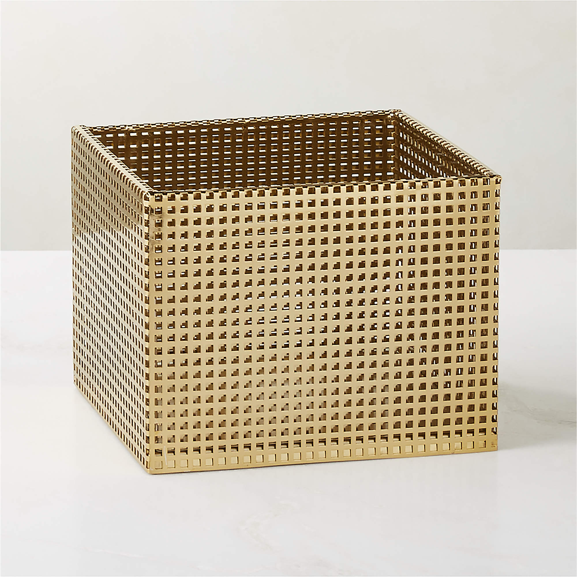 Shop TEGAN PERFORATED BRASS METAL STORAGE BASKET SMALL, Quantiti: 2 from CB2 on Openhaus
