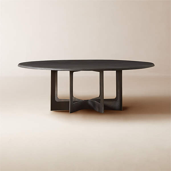 https://cb2.scene7.com/is/image/CB2/TitusCastAlmnCoffeeTableSHF23/$web_pdp_main_carousel_xs$/230628101016/titus-round-blackened-cast-aluminum-coffee-table.jpg