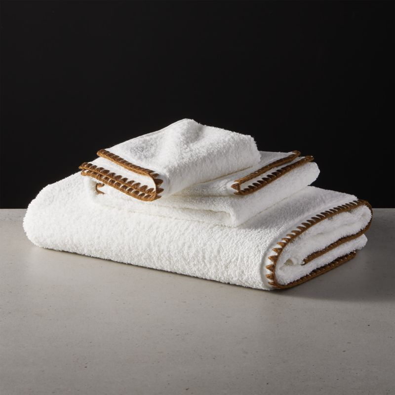 white towels with silver trim