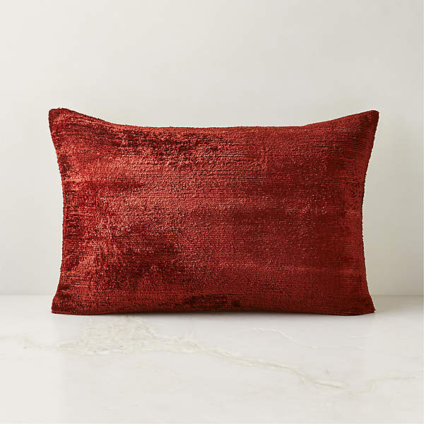 https://cb2.scene7.com/is/image/CB2/TurkishSlkGntDAPllw18x12SHF23/$web_pdp_main_carousel_xs$/230622094103/truette-garnet-red-turkish-silk-throw-pillow-18x12.jpg