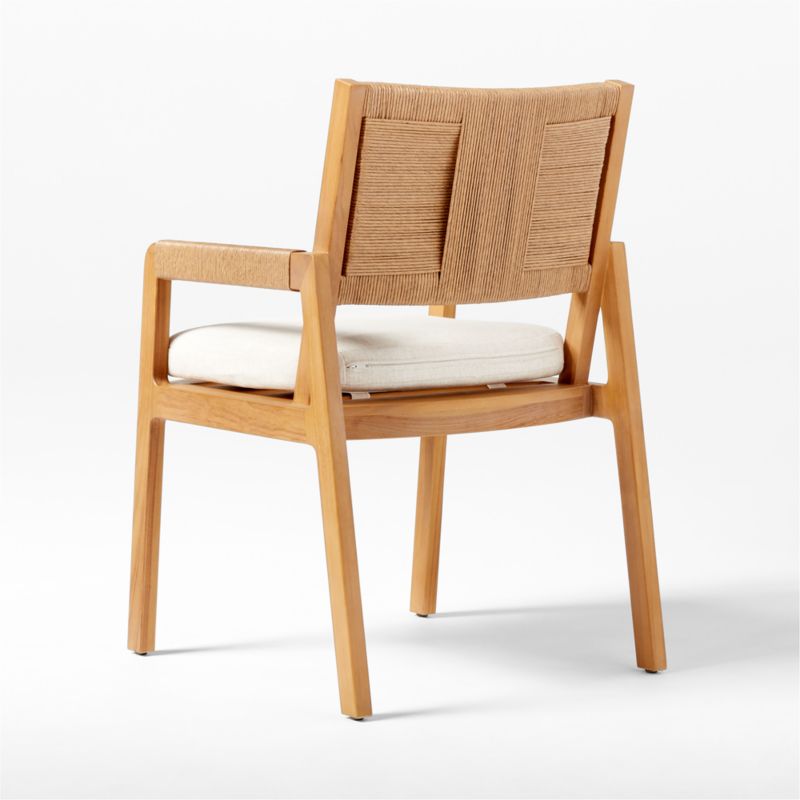 Roc Teak and Rattan Dining Armchair with Ivory Sunbrella® Cushion - image 9 of 12