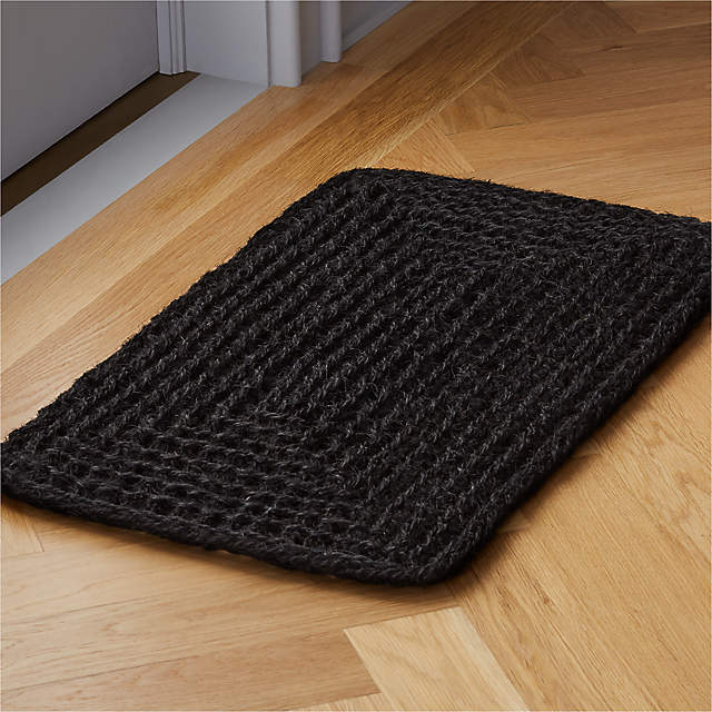 https://cb2.scene7.com/is/image/CB2/WaffleBlackDoormat18X30SHS21/$web_pdp_main_carousel_zoom_xs$/201116092344/waffle-black-doormat.jpg