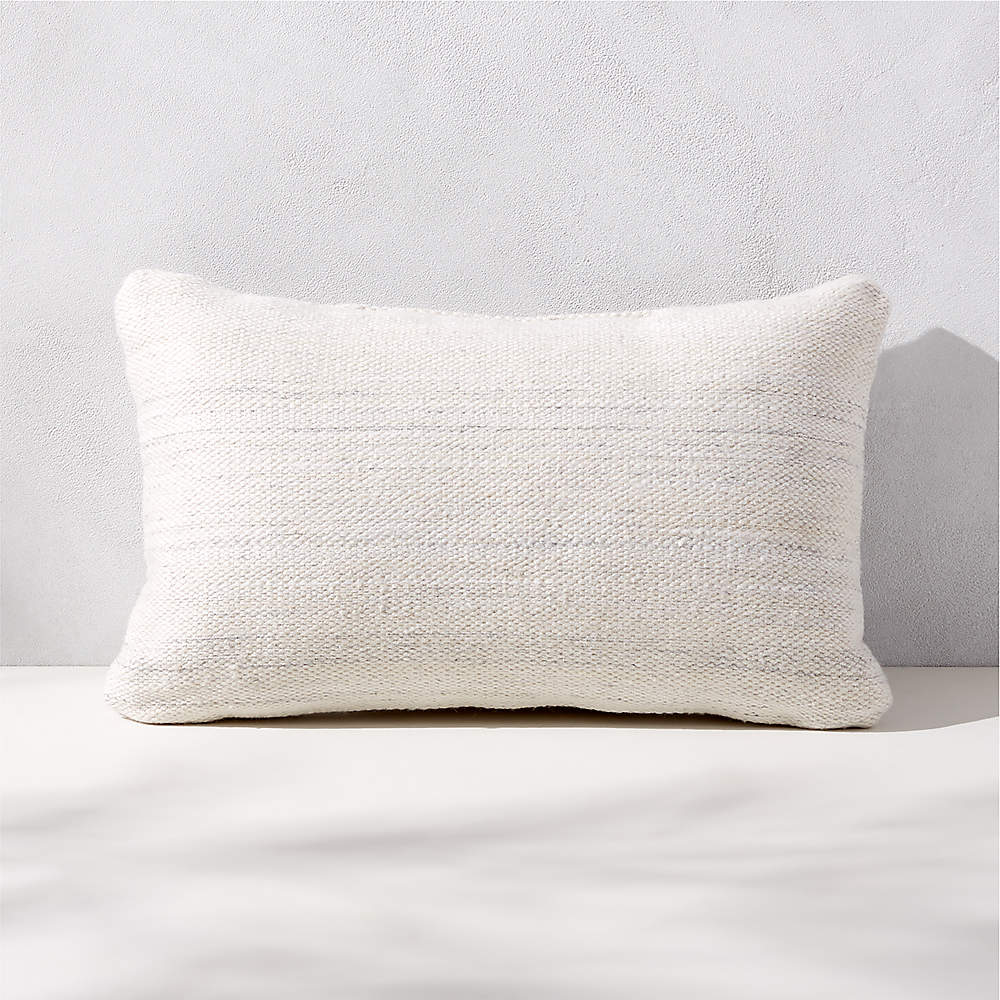 https://cb2.scene7.com/is/image/CB2/WaverlyIvoryODPillow20x12SHS23/$web_pdp_main_carousel_sm$/230113113620/waverly-ivory-outdoor-throw-pillow-20x12.jpg