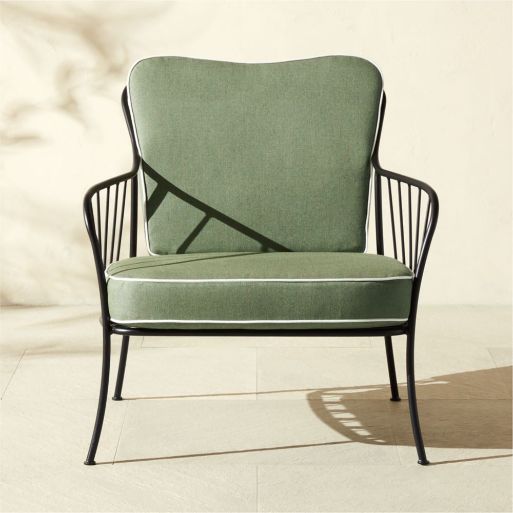CB2 Welling black metal outdoor chair with green cushions