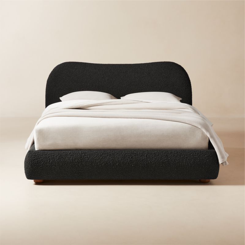 Black upholstered bed top