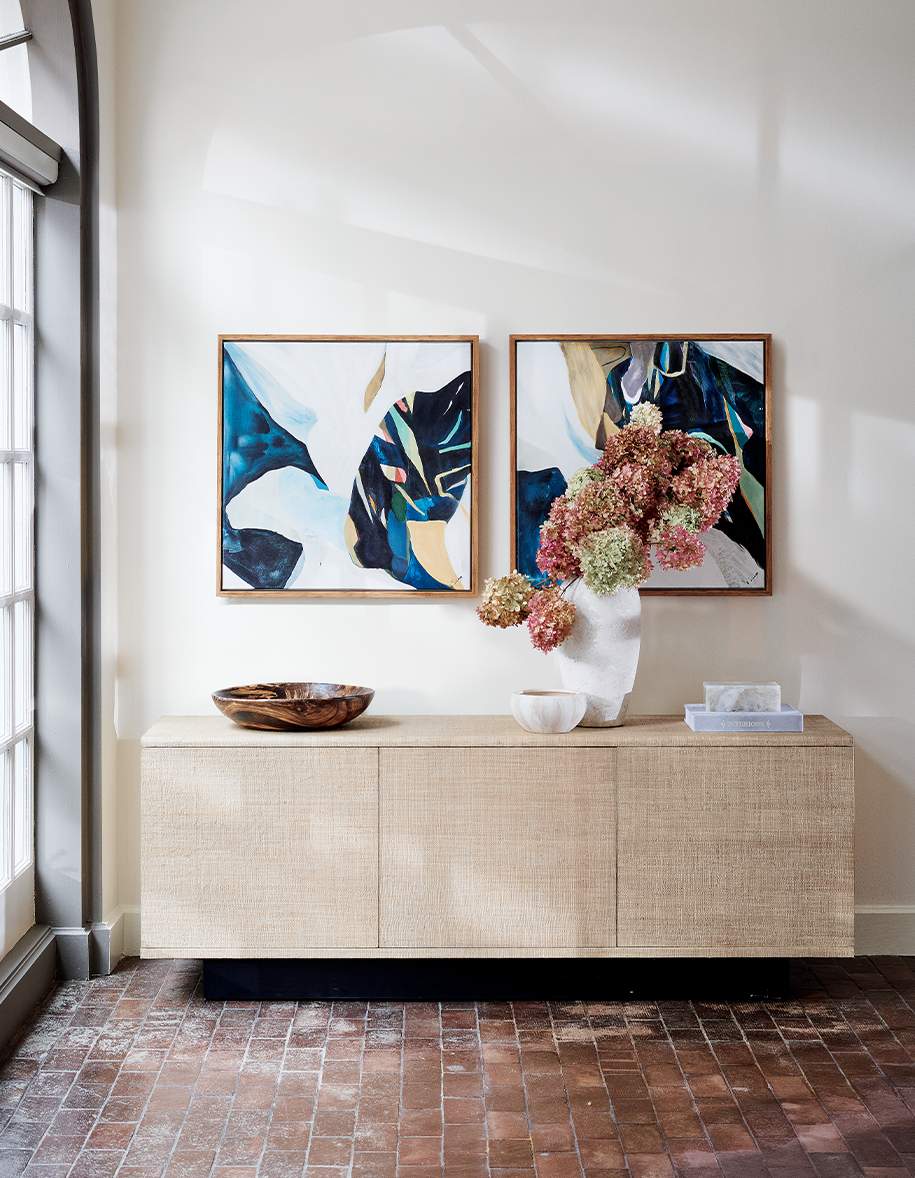 entryway with grasscloth media credenza